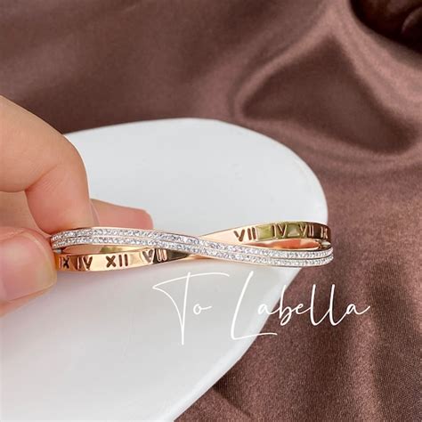 cartier roman numeral ring|cartier heart bracelet.